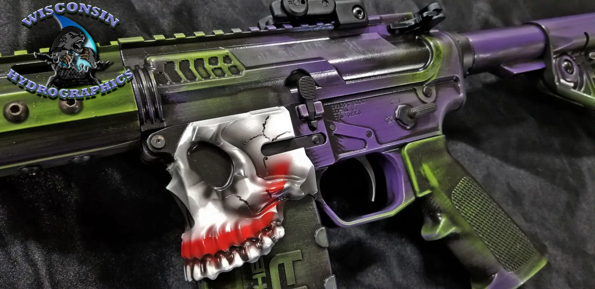 A rifle with a joker design